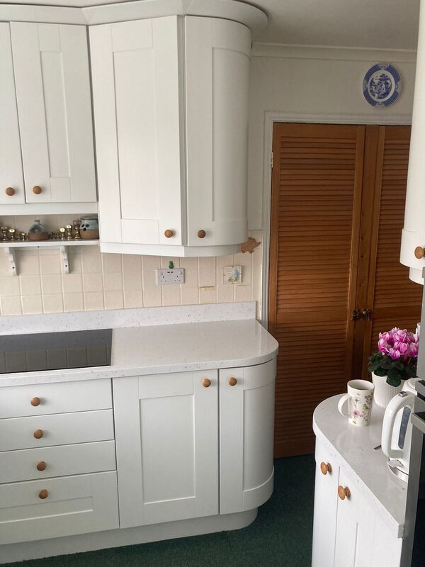 After Spray painted kitchen with spray painted worktops and doors