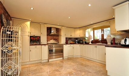New kitchen makeover with new ivory doors and solid oak worktops